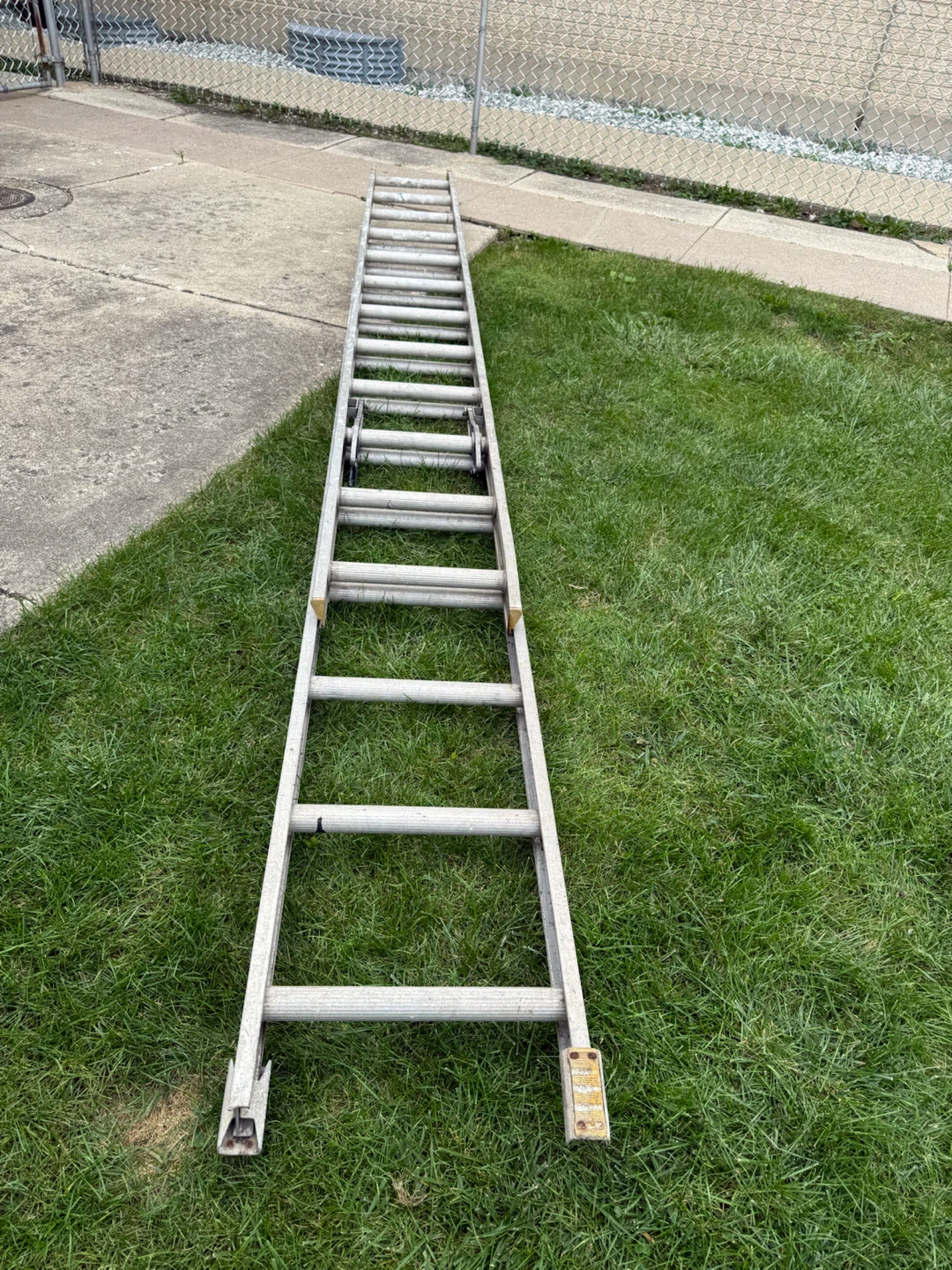 24 ft Aluminum Extension Ladder. $100.00 or best offer. - photo 2