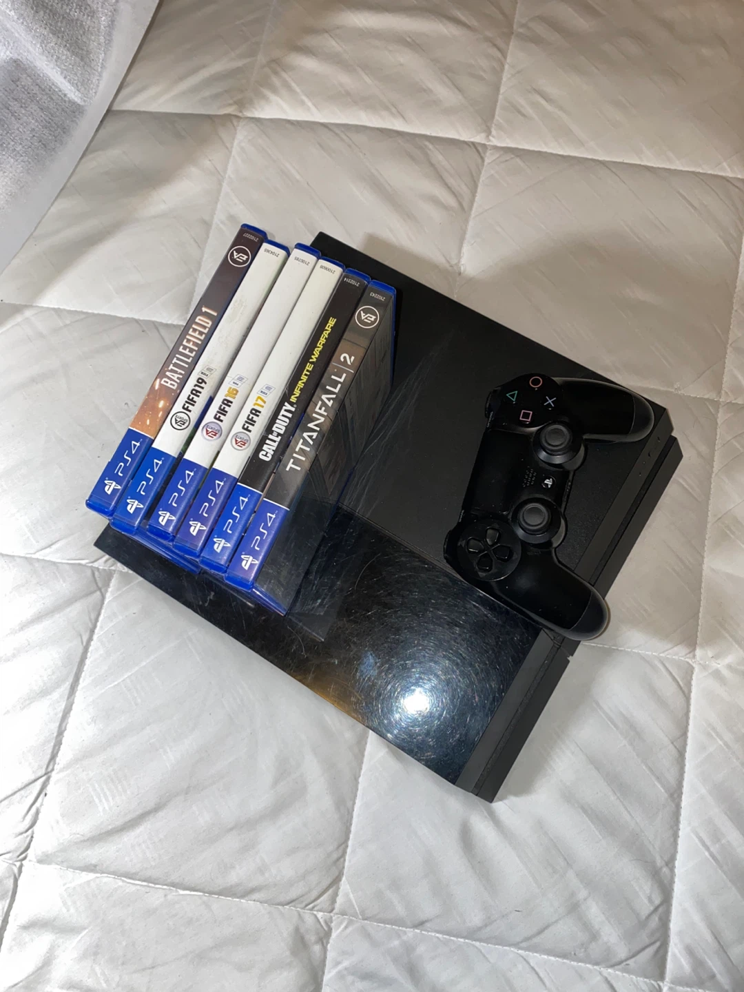 PlayStation 4 Console with Controller and 5 Games