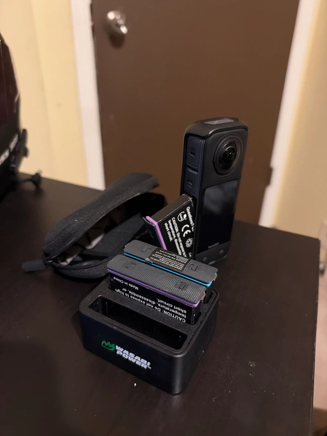 Insta360 One X4 with Wasabi Power Charger and Batteries