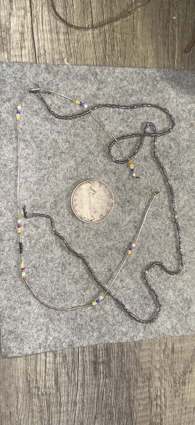 Broken beaded necklaces some metal beads and glass beads