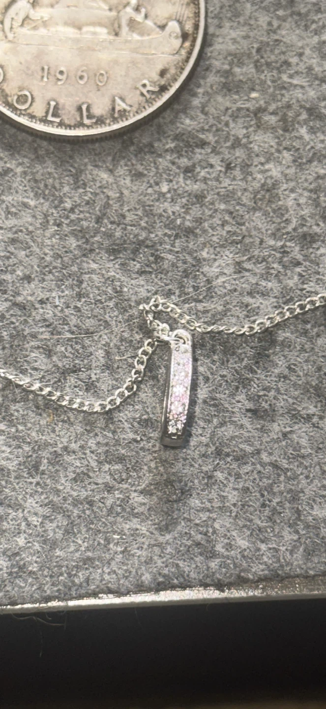 Tear drop style pendant and silver tone necklace - photo 2