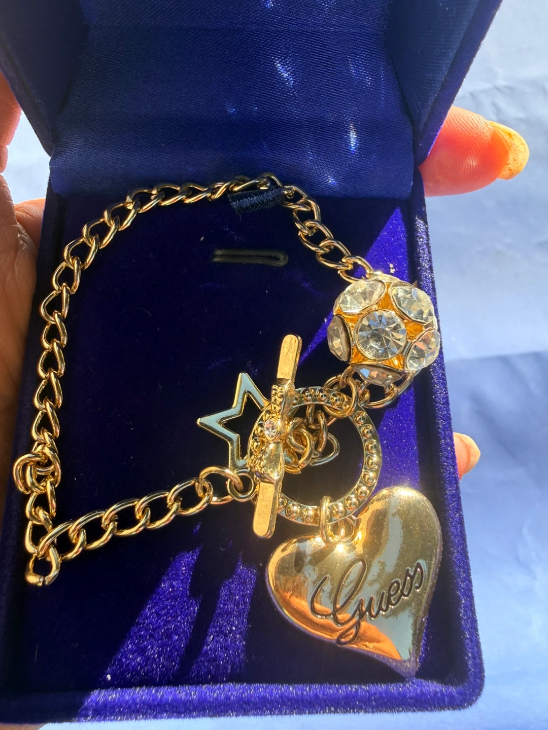 Guess gold-tone heart charm bracelet