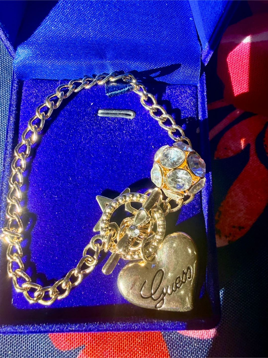 Guess gold-tone heart charm bracelet - photo 4