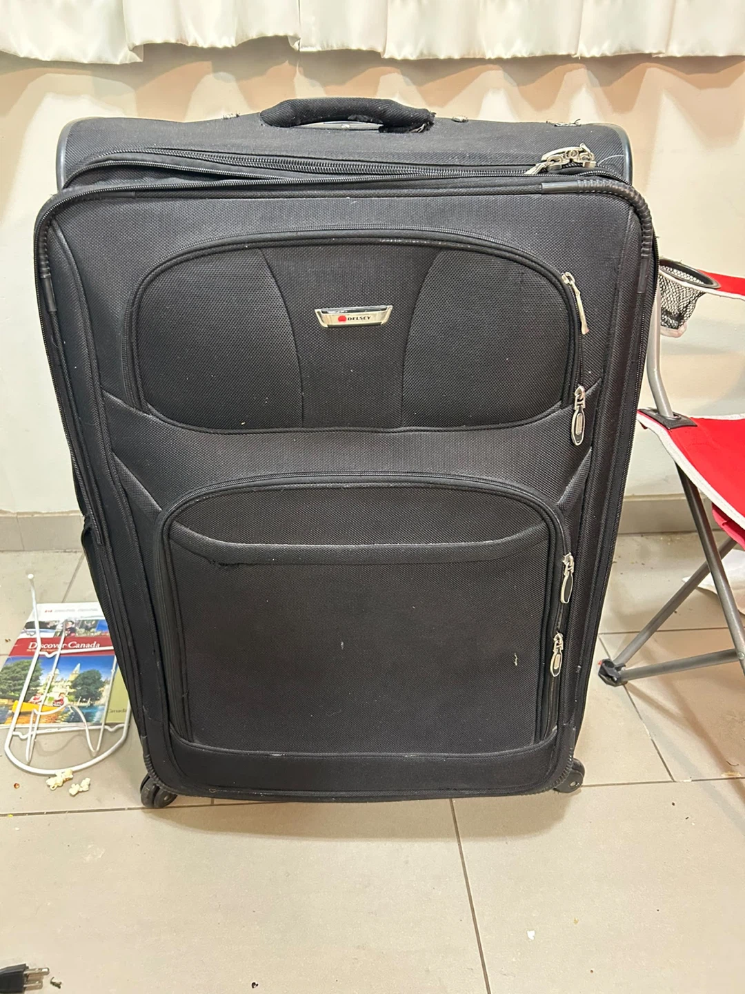 Delsey Lightweight Black Rolling Luggage