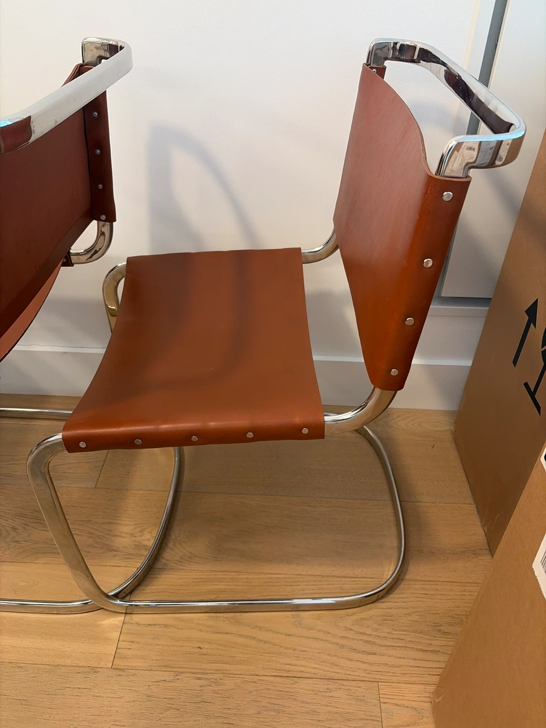 CB2 Tan Leather and Chrome Cantilever Dining Chairs (CB2)