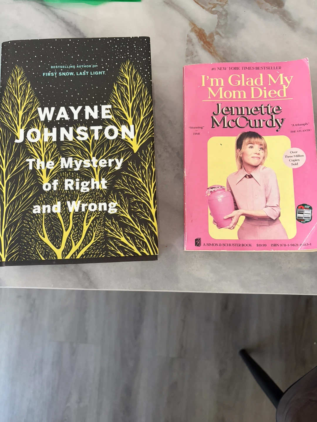 Two books for 20 ( one new hardcover , one used )