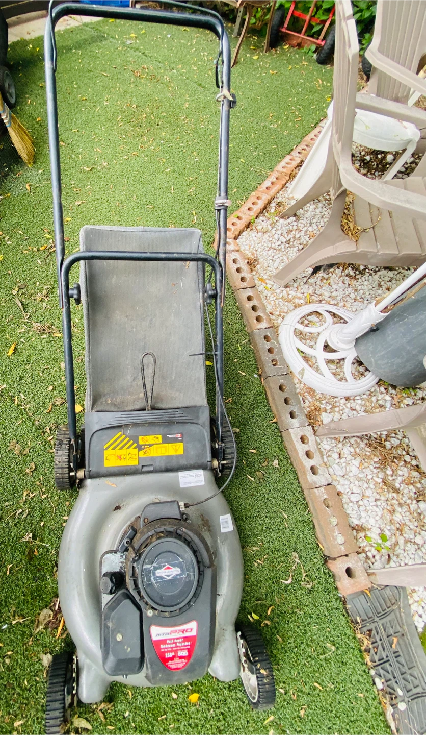 Gas-powered push lawn mower sold as is - photo 3