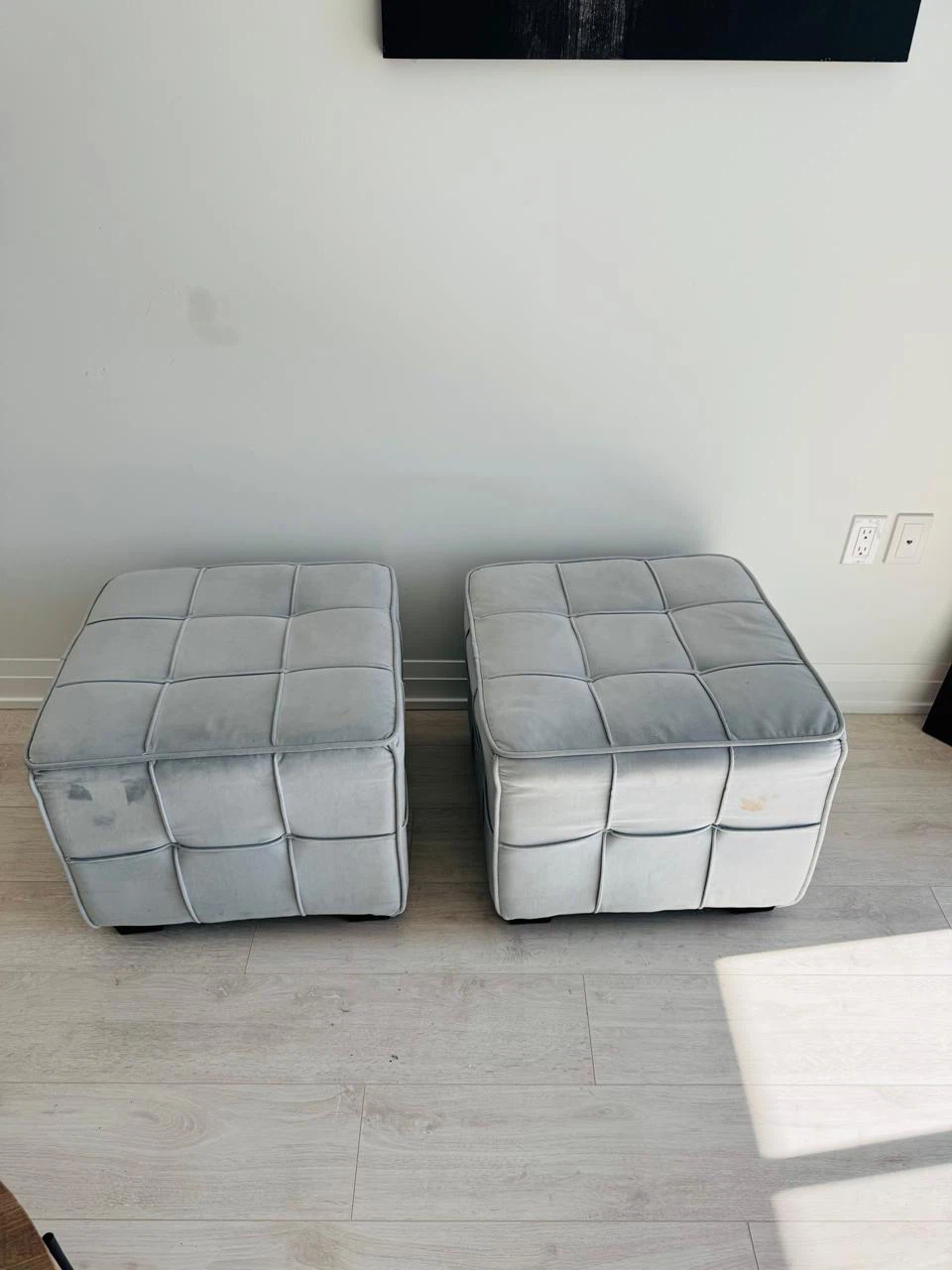 Two Tufted Grey Velvet Ottomans
