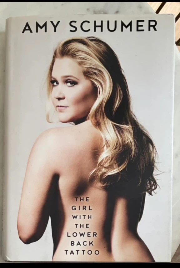 “The Girl With the Lower Back Tattoo”