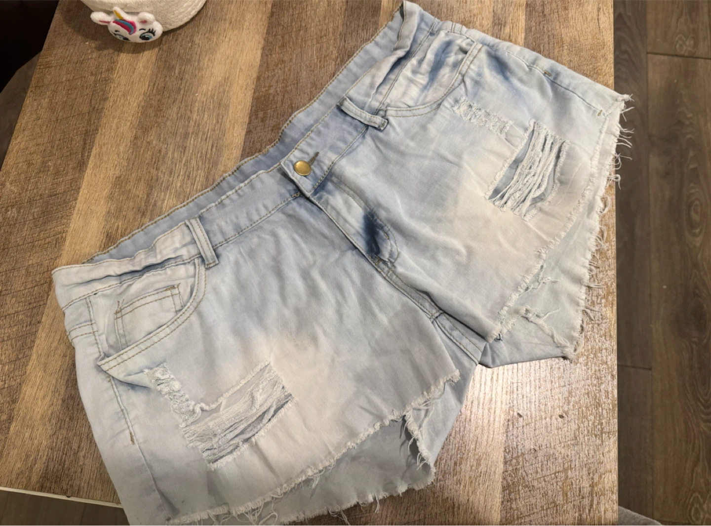 Light wash distressed denim shorts