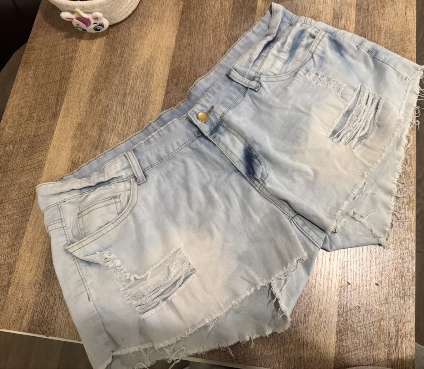 Light wash distressed denim shorts - photo 2
