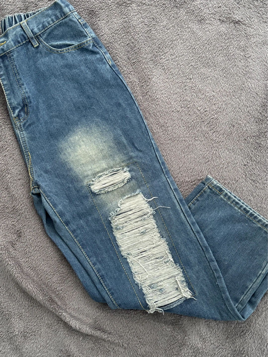Distressed Light Wash Denim Jeans