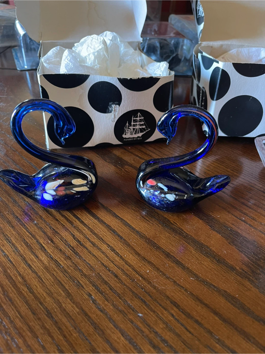 Pair of blue glass swan figurines