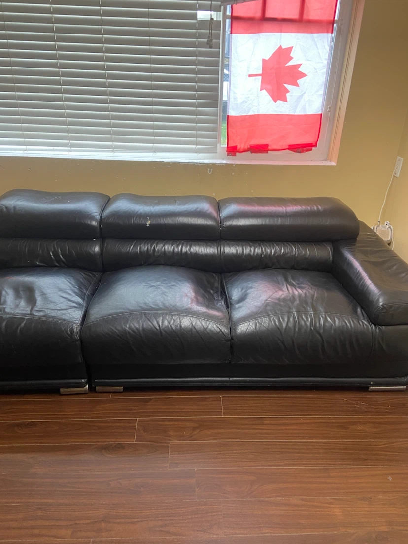 Black Leather Three-Seater Sofa