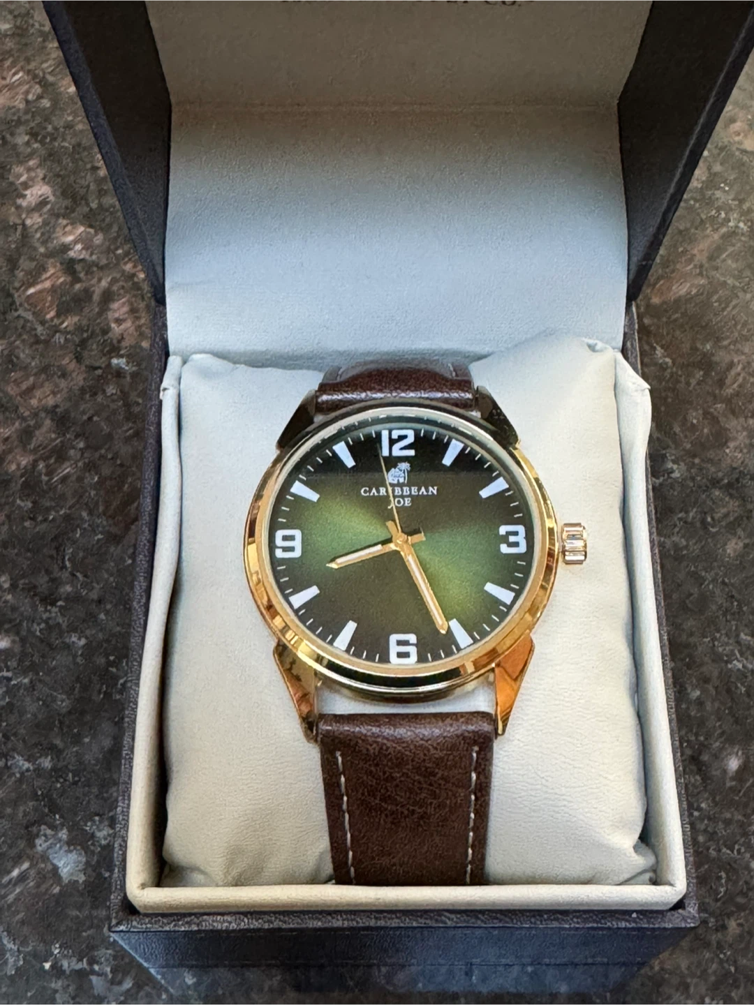 Gold watch by CARIBBEAN JOE