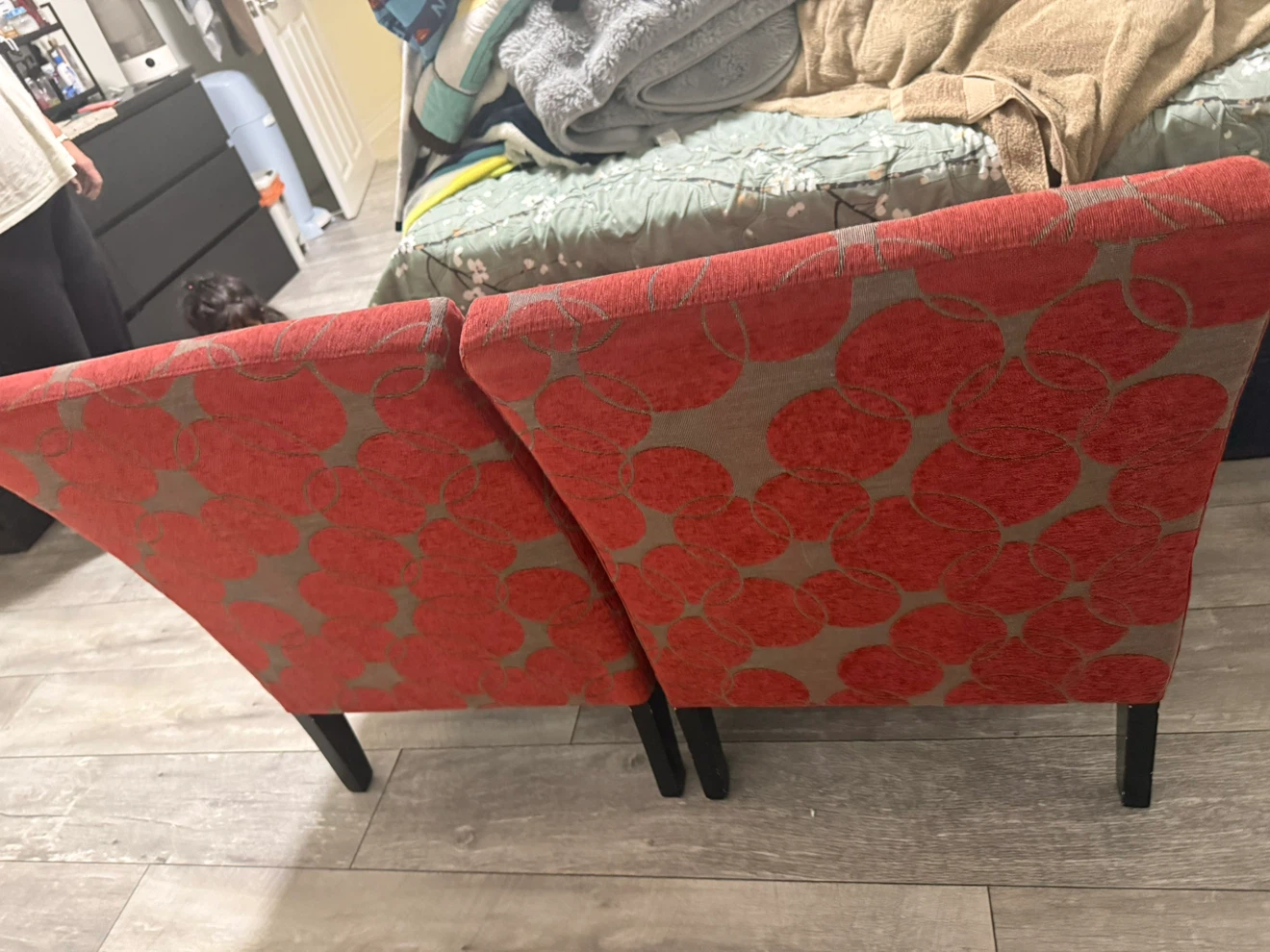 Two armless accent chairs