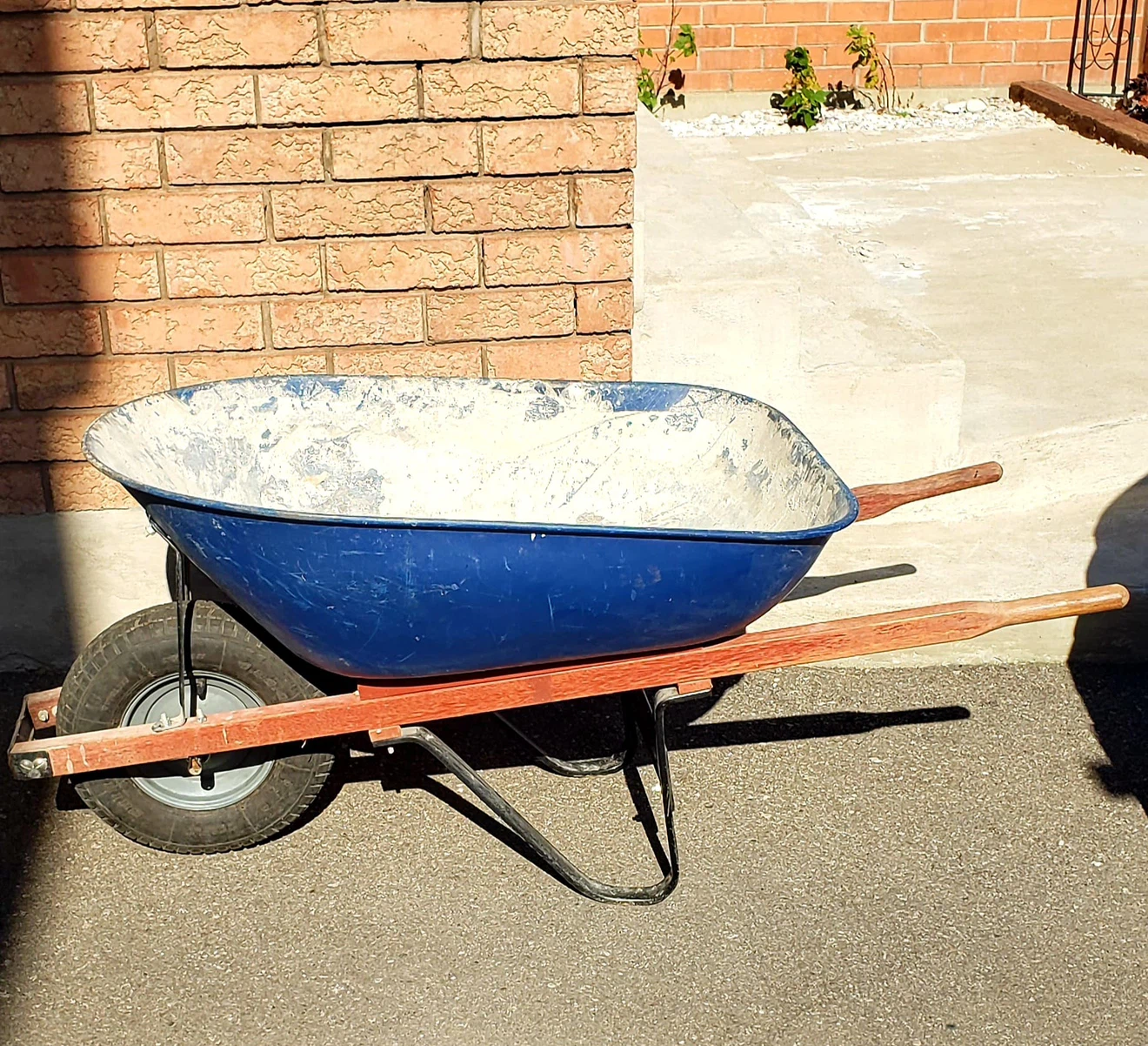 Blue metal wheelbarrow