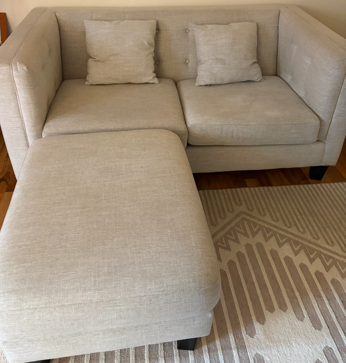 Beige Upholstered Sofa with Ottoman