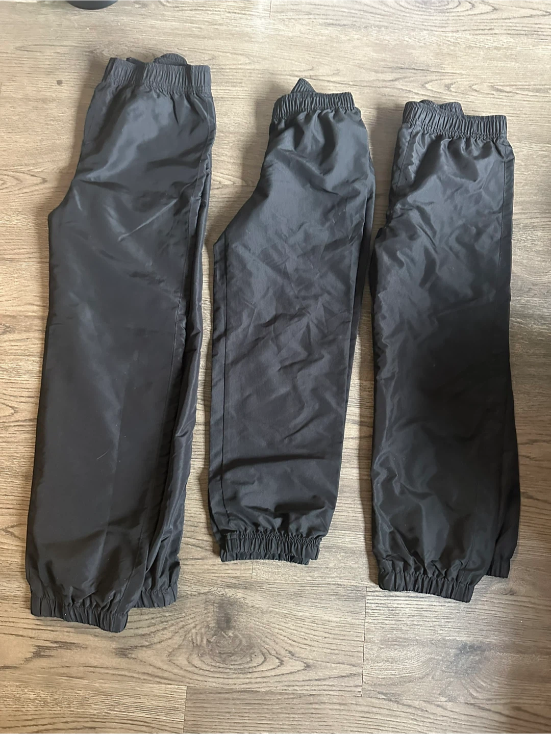 Three pairs of Children's Place black wind pants