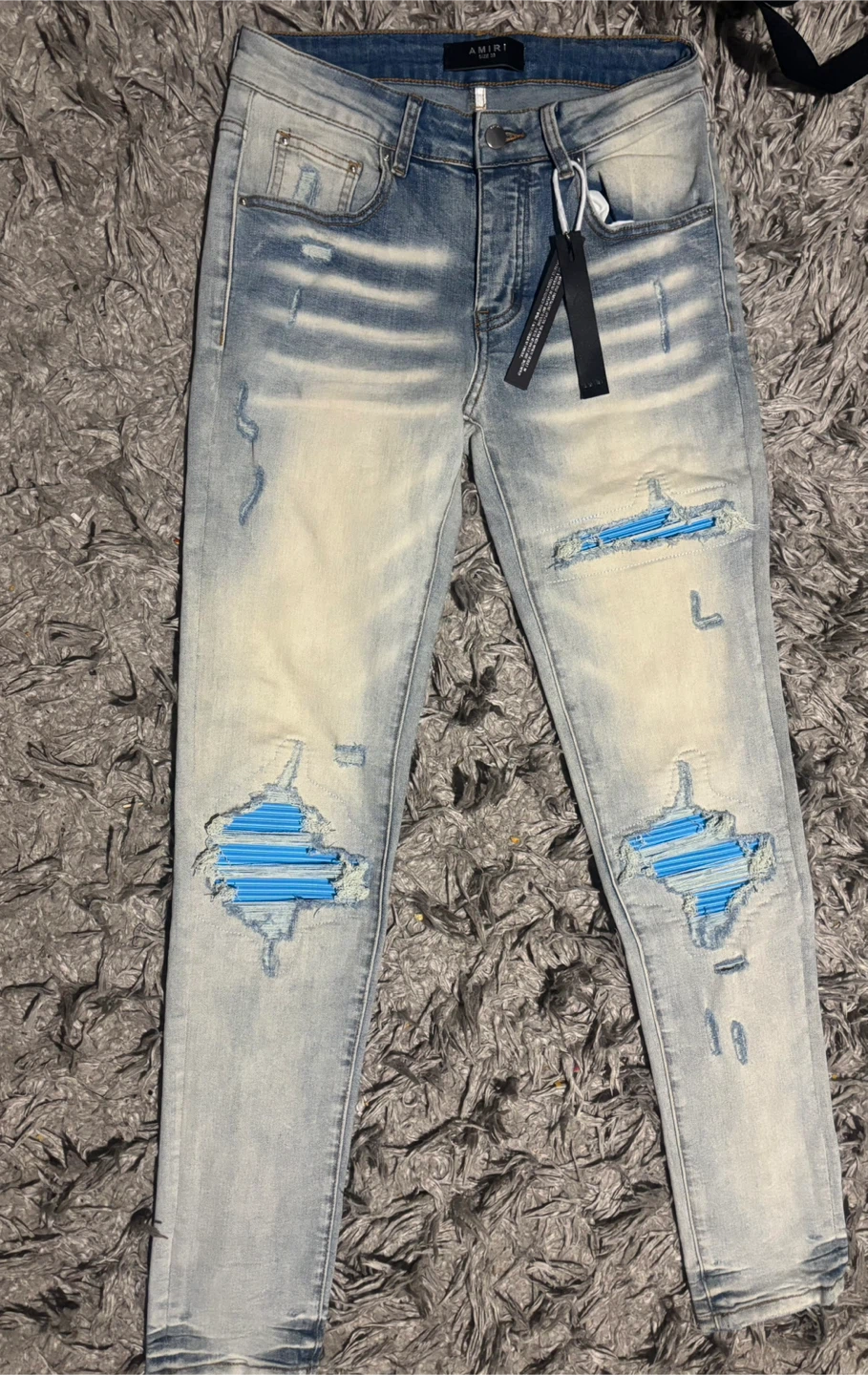 AMIRI Light Wash Distressed Jeans - photo 2