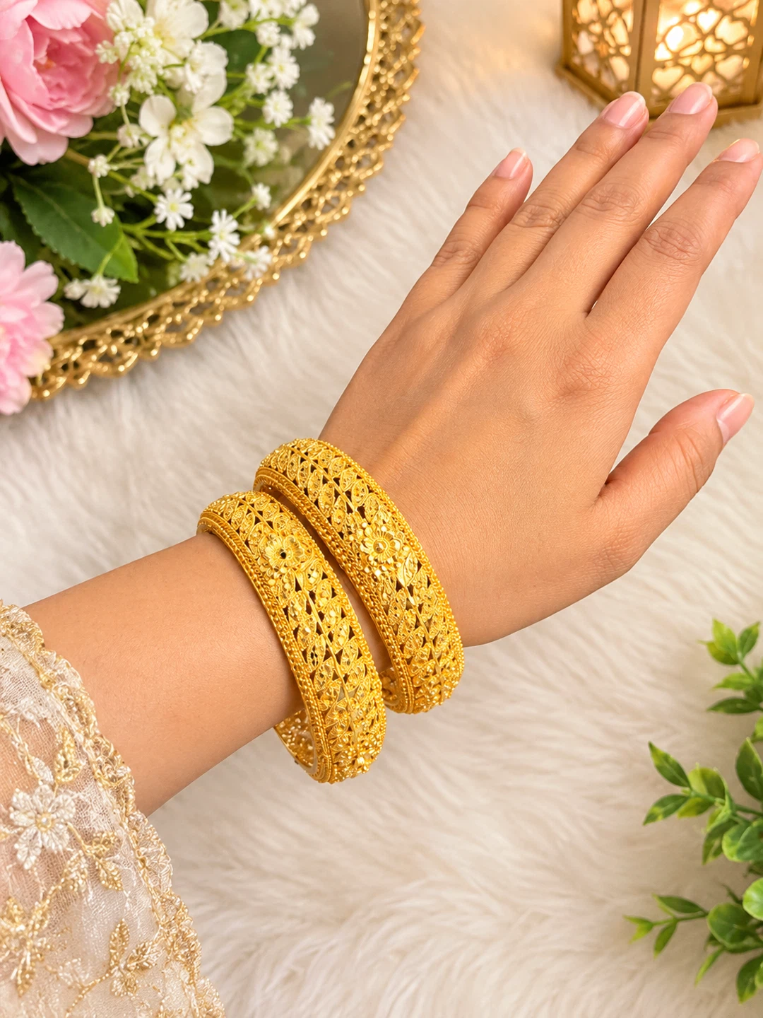 Set of two gold plate bangles