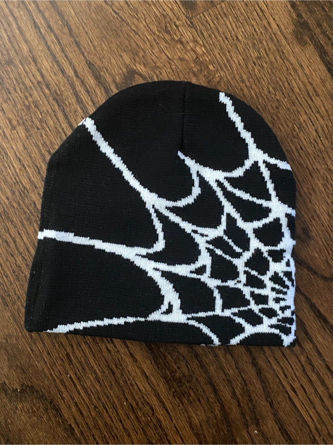 Black and white spiderweb beanie