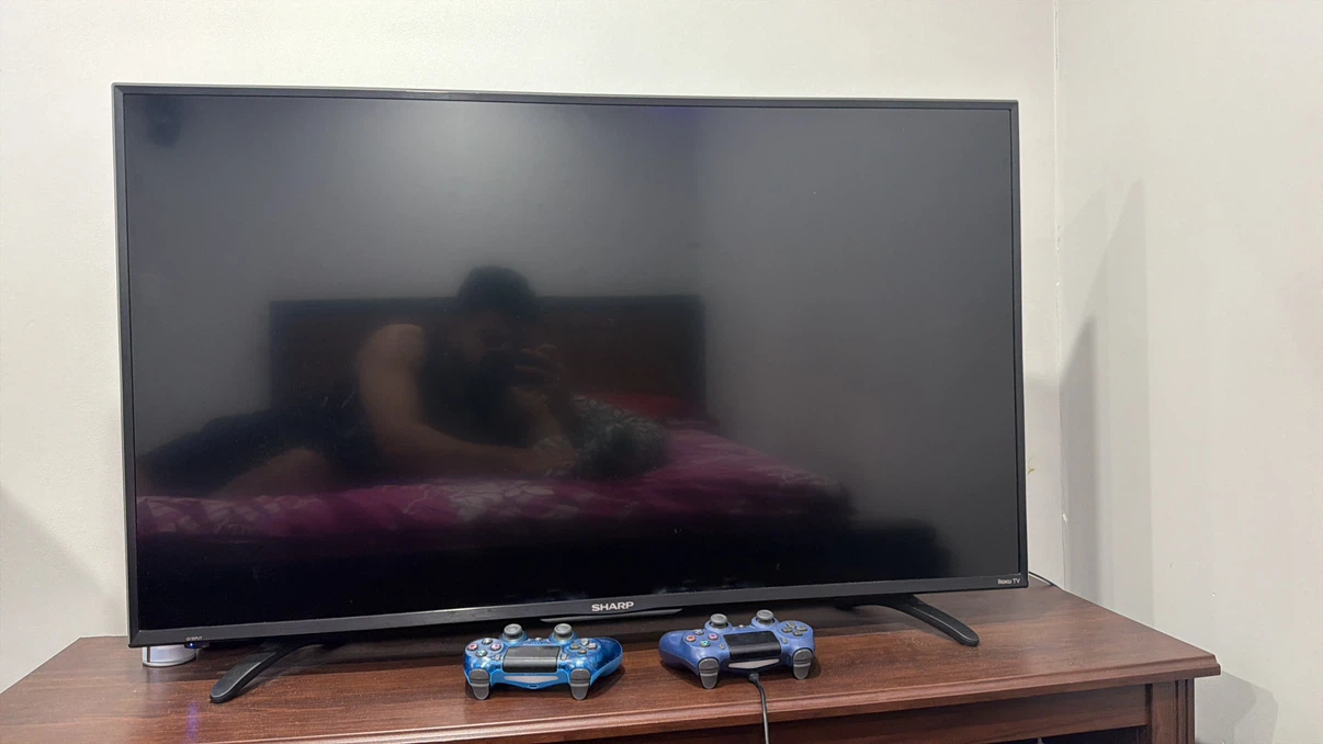 Sharp 50-inch LED Roku TV and tv stand
