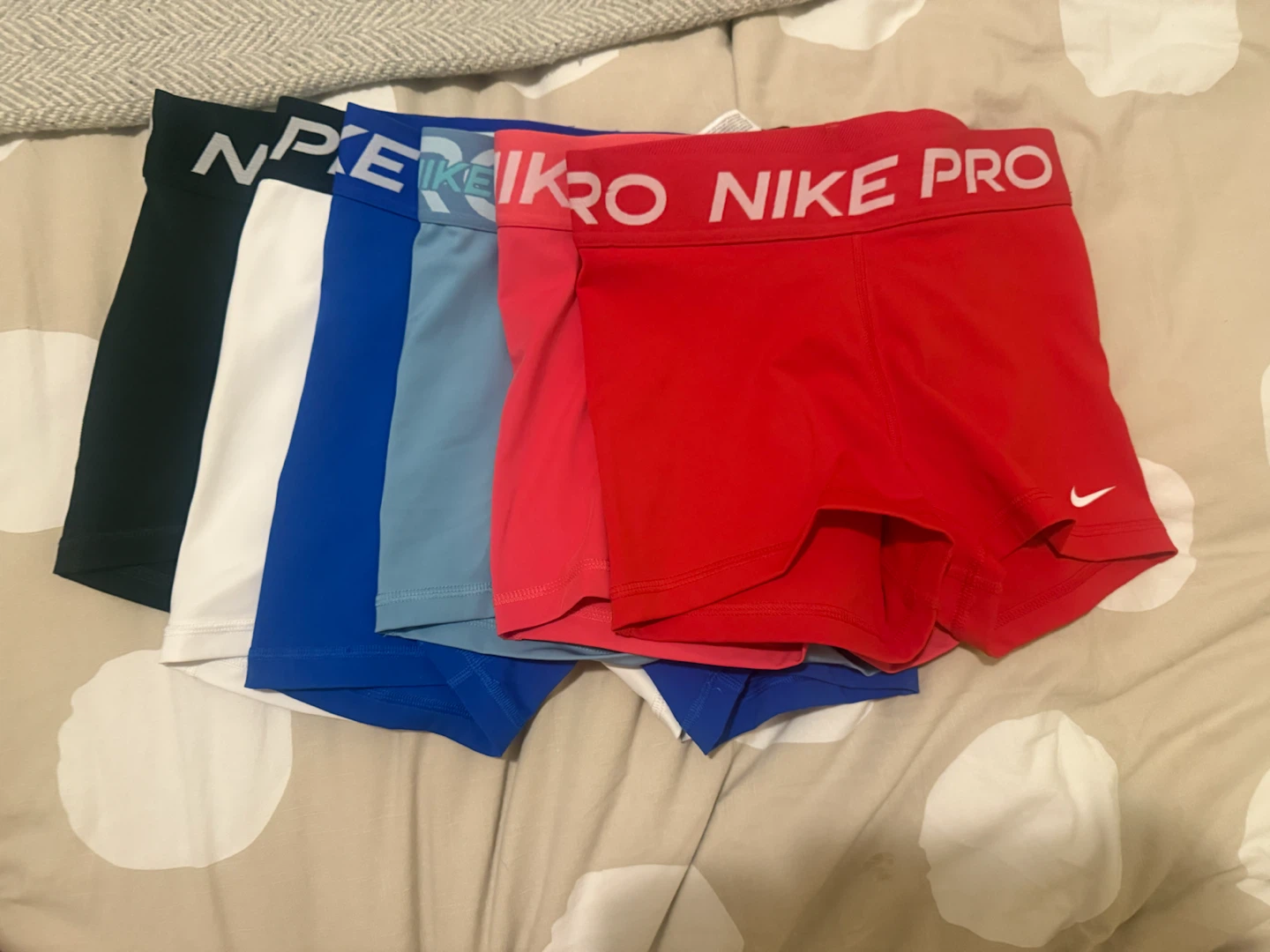 5 pairs of Nike Pro athletic shorts
