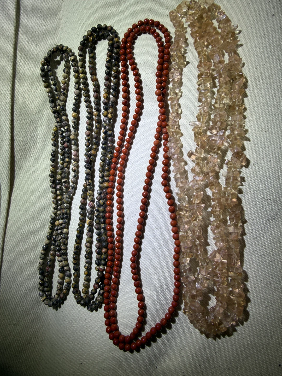 Set of four natural stone bead necklaces