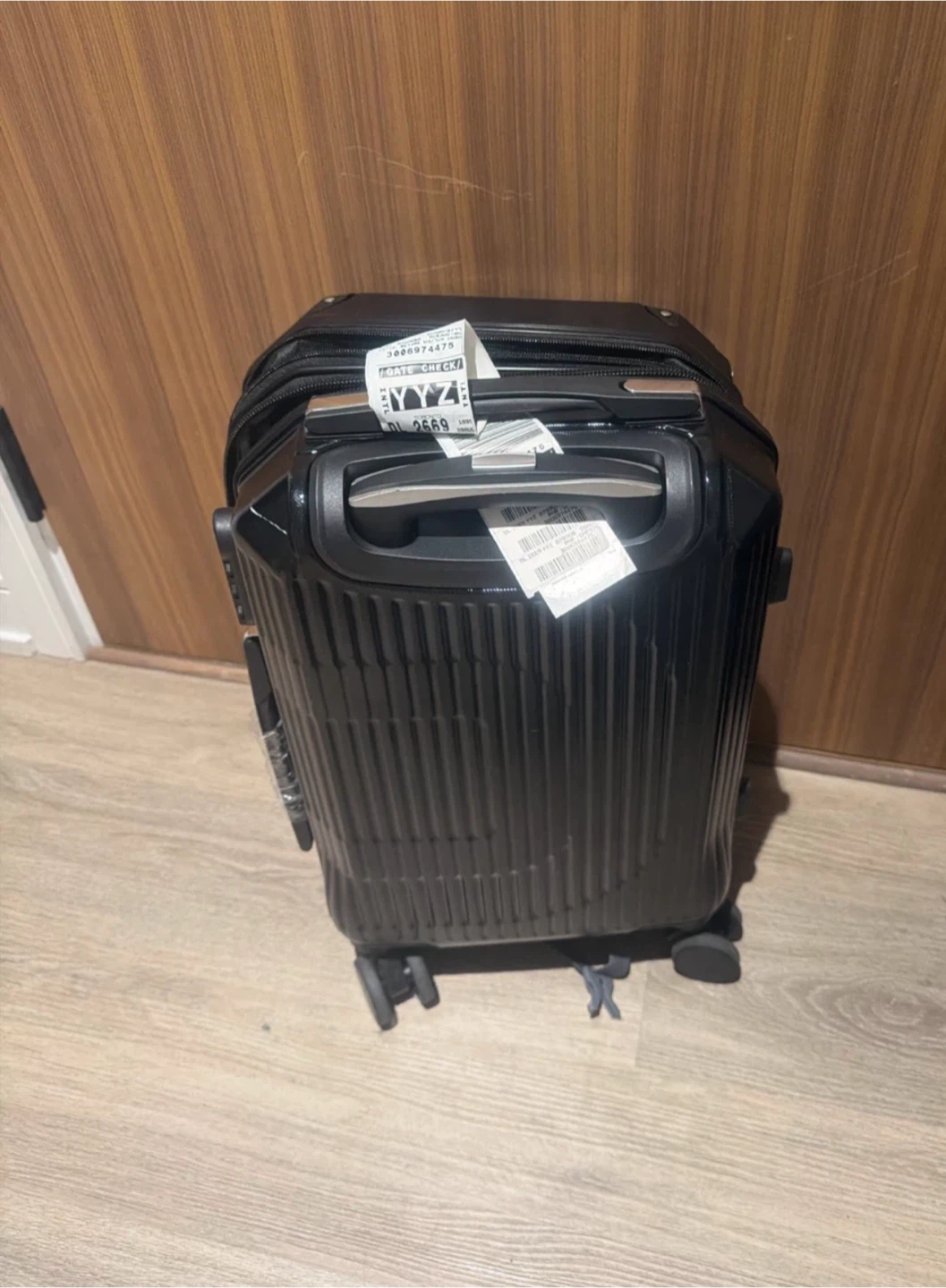 Black Hardside Carry-on Spinner Suitcase