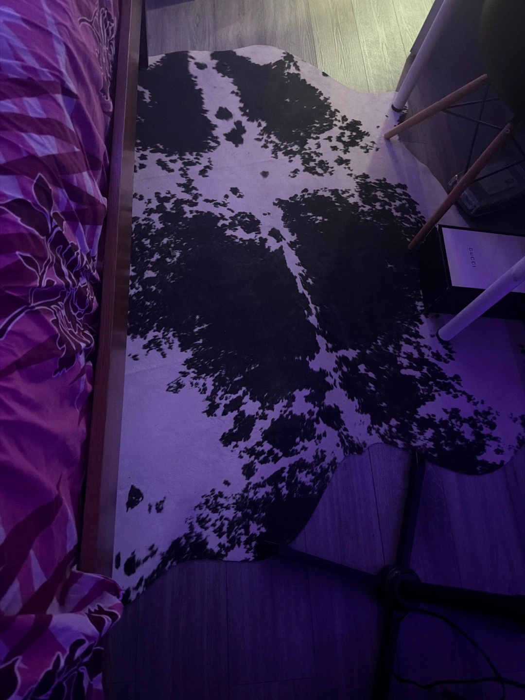 Cow print faux hide rug