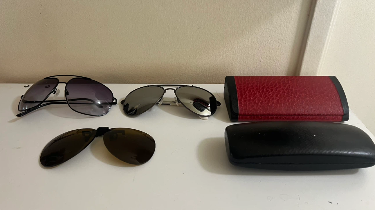 Two pairs of aviator sunglasses and clip-ons-price of Each