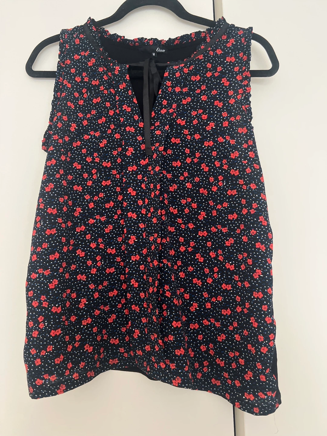 Étant Floral Sleeveless Blouse