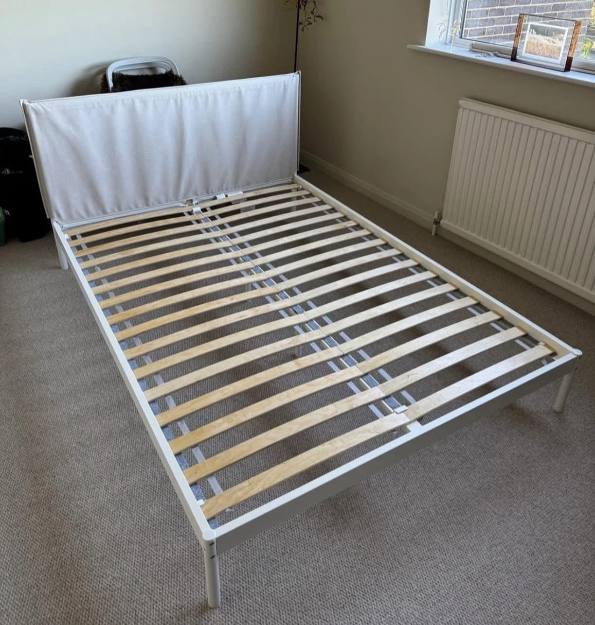 IKEA Queen bed frame with cloth headboard