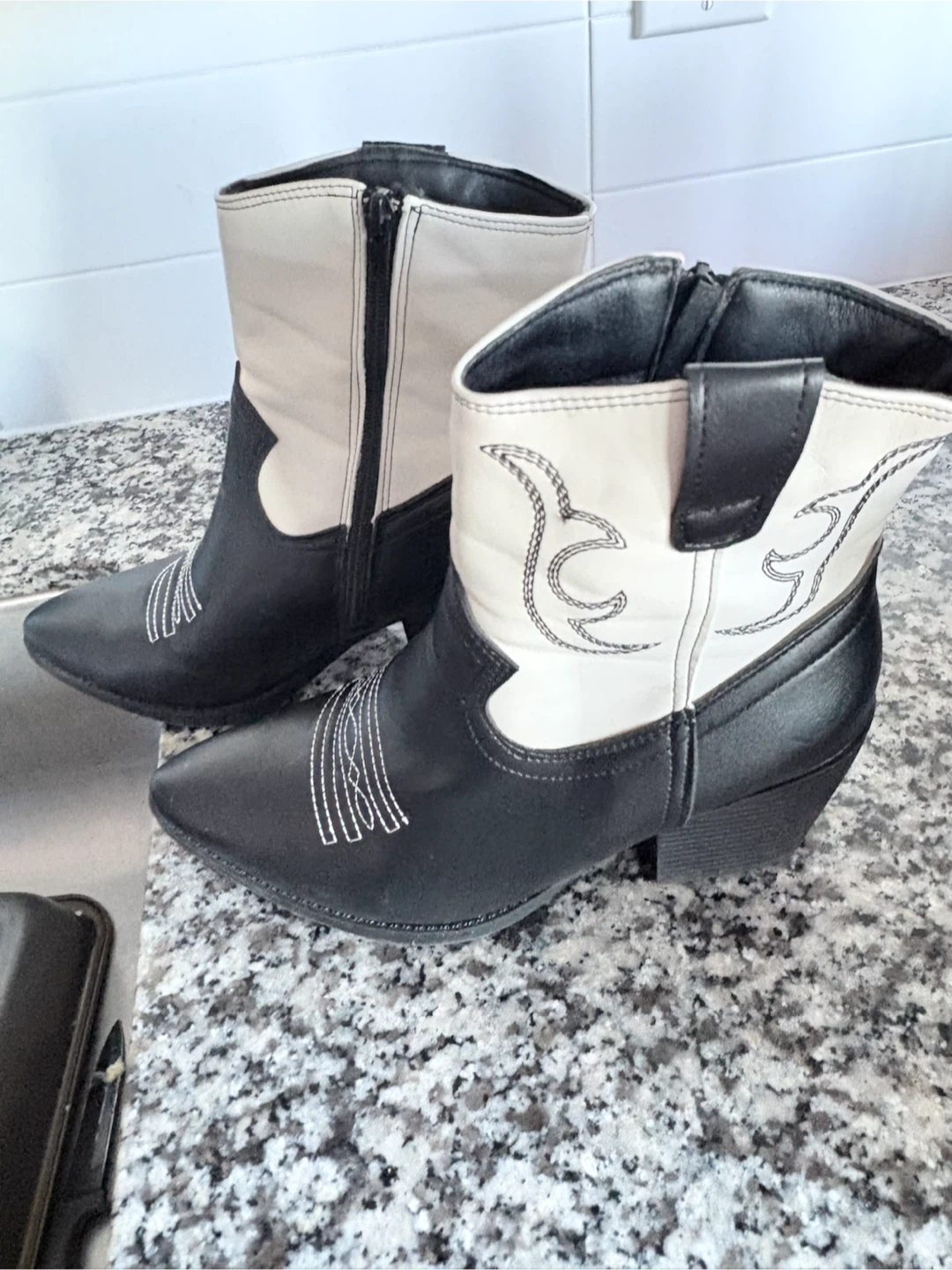 Black and white western ankle boots