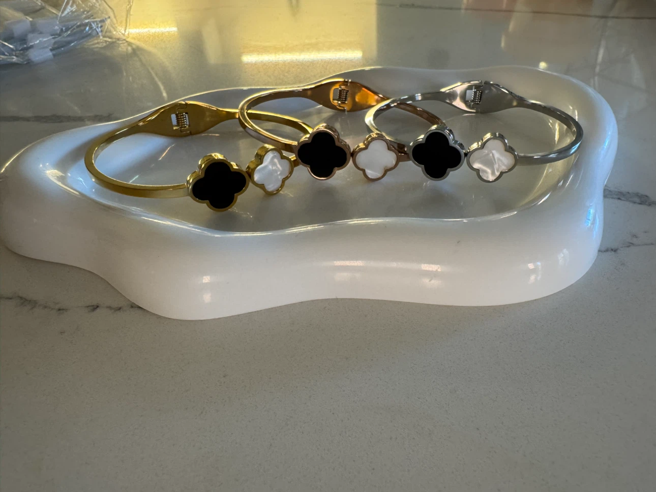 Clover motif bangles