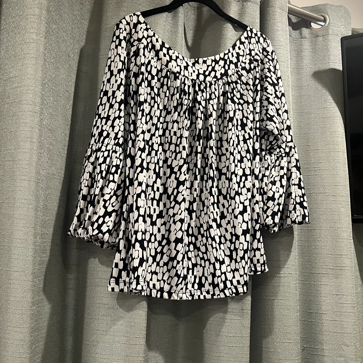 Black and white patterned blouse