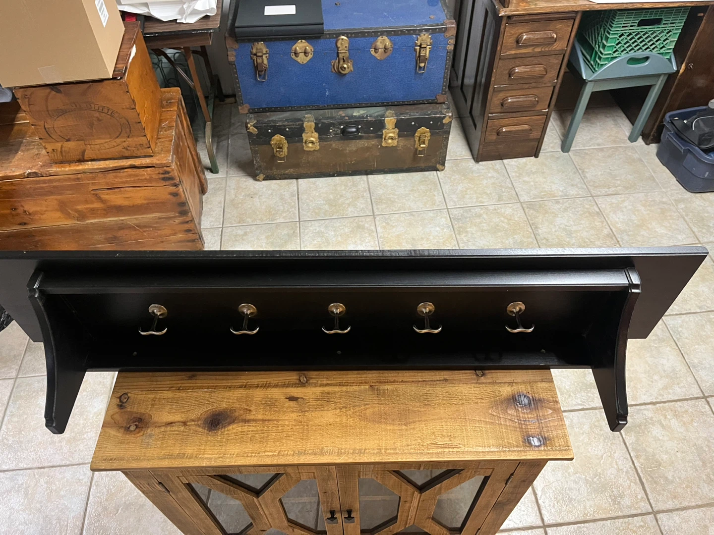 Black solid wood shelf with coat hooks