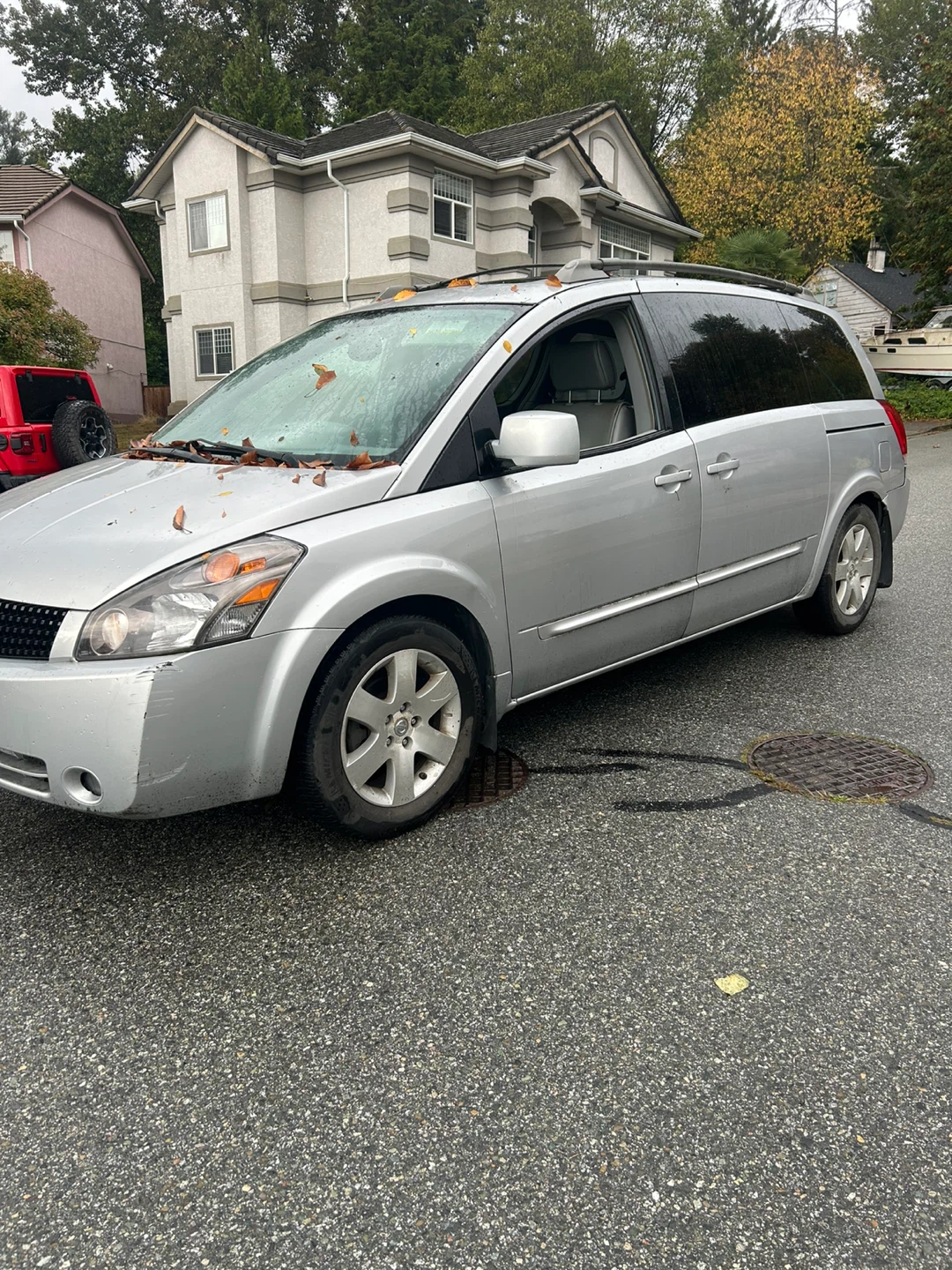 Silver Nissan Quest 3.5 S Minivan