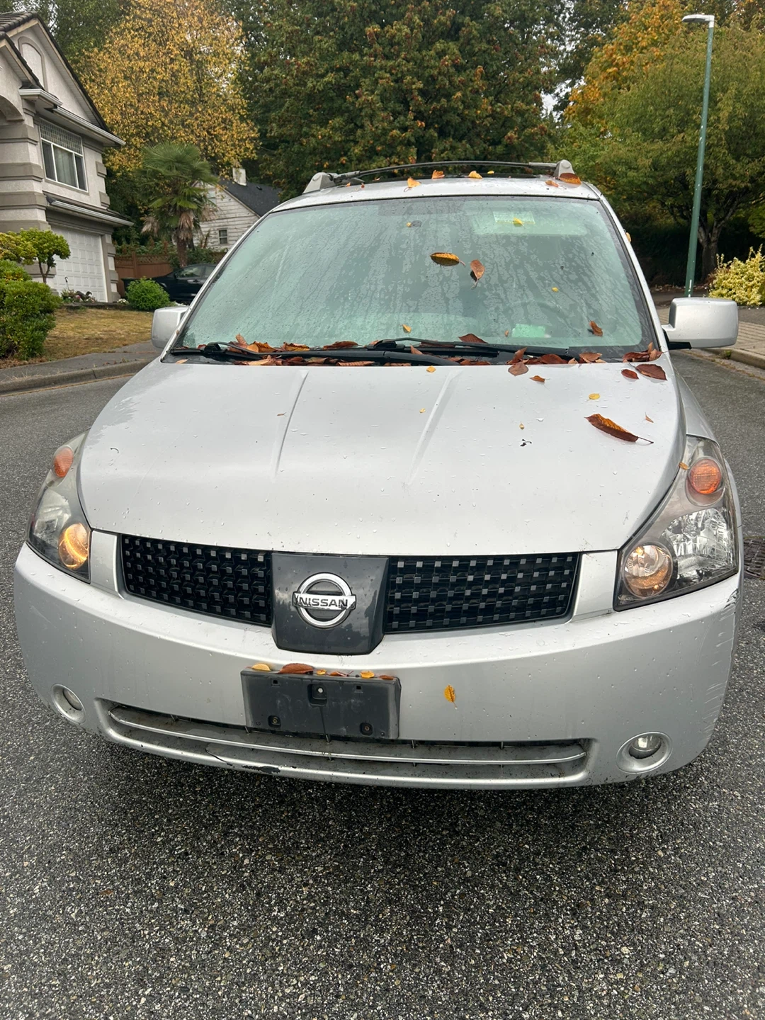 Silver Nissan Quest 3.5 S Minivan - photo 2