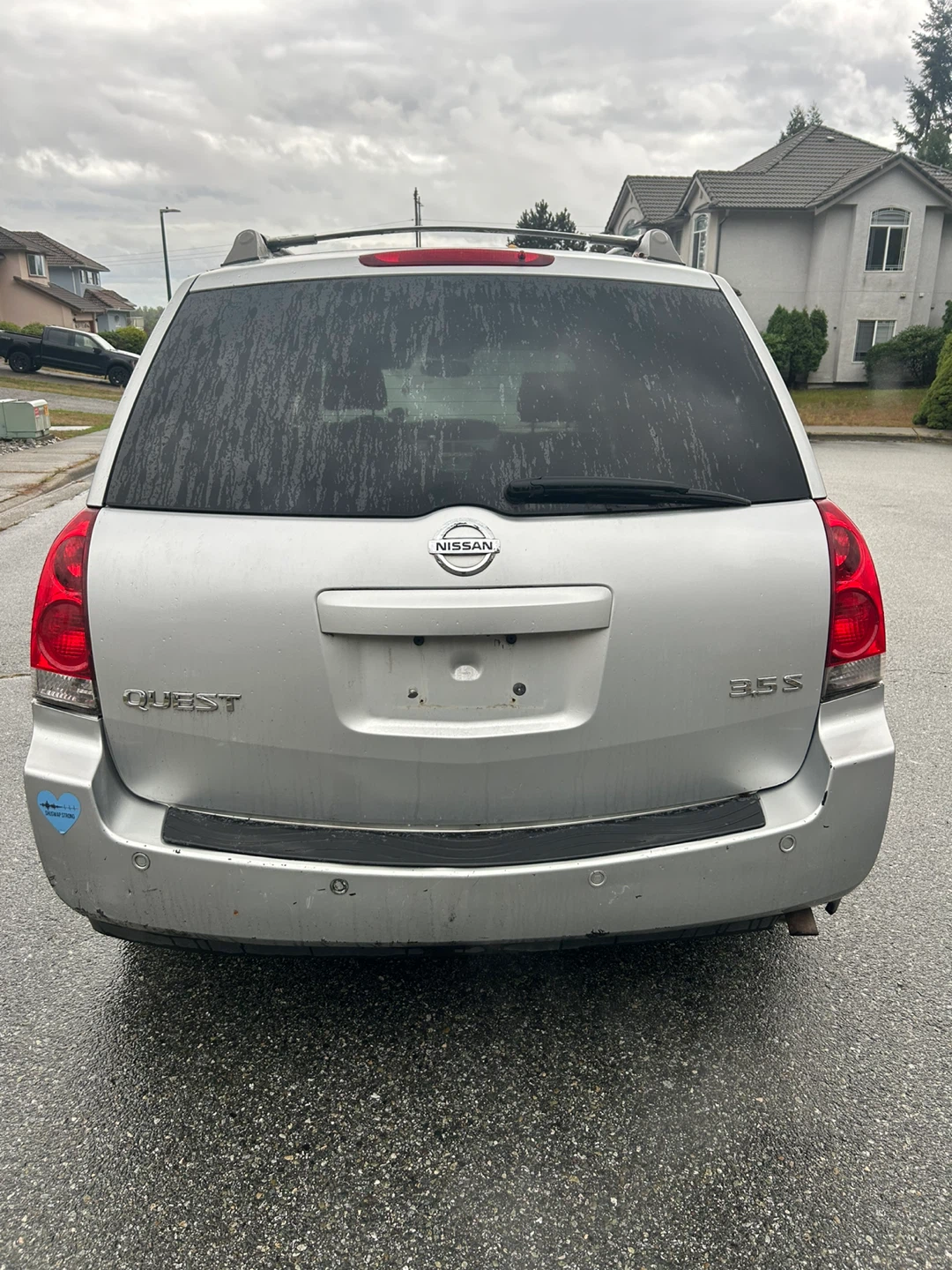Silver Nissan Quest 3.5 S Minivan - photo 4