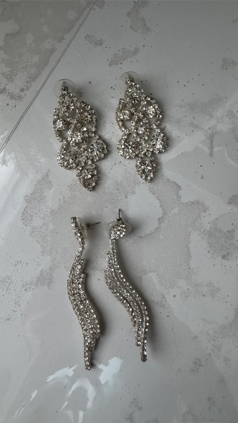 Two pairs of crystal statement earrings