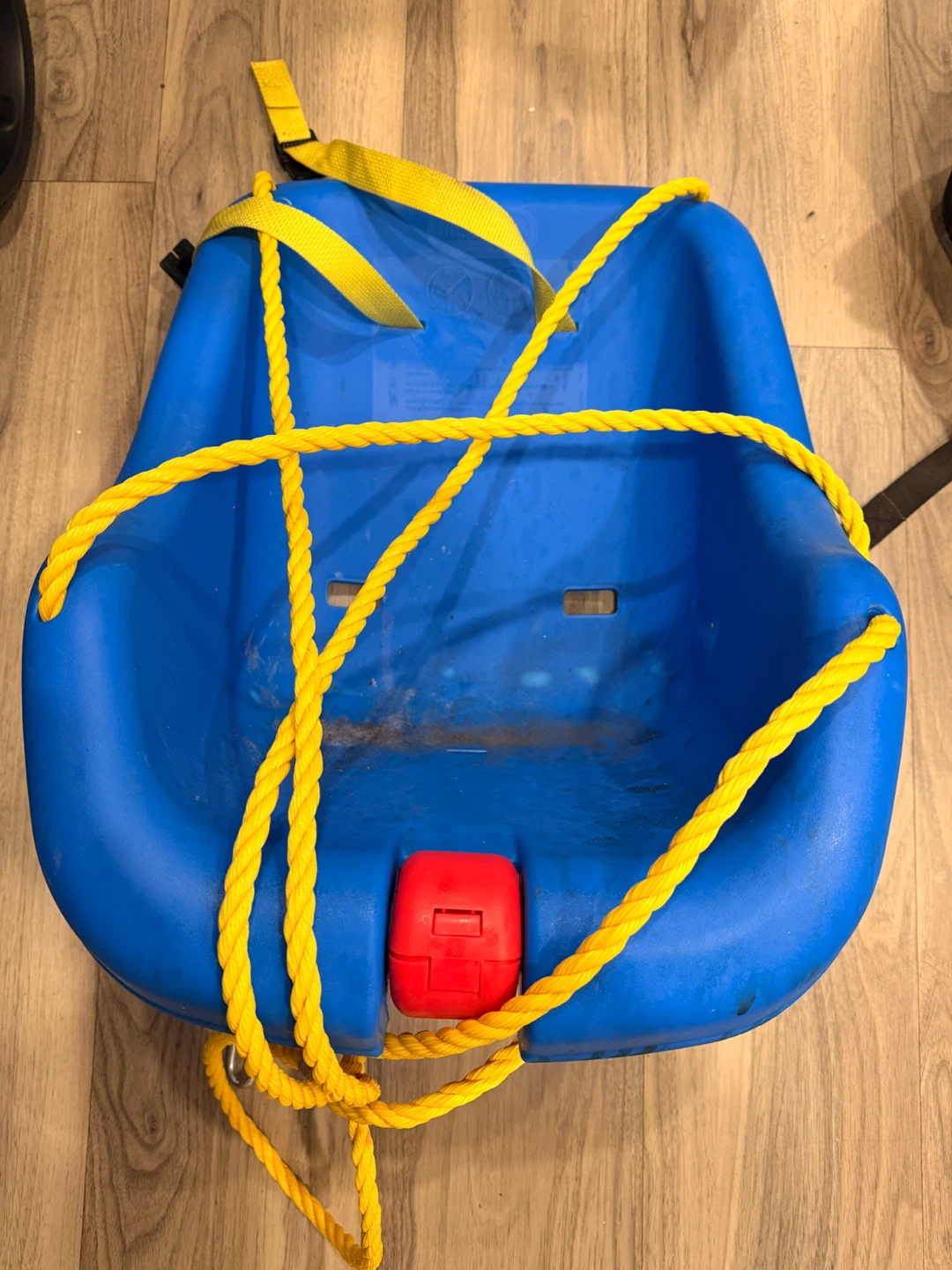 Blue plastic toddler bucket swing