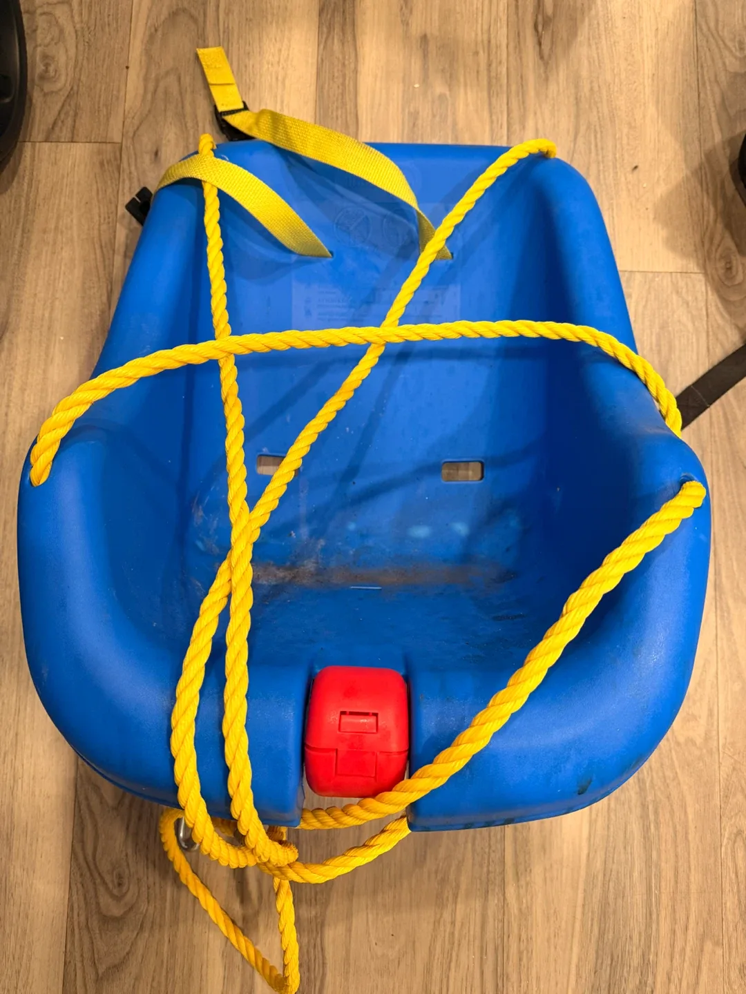 Blue plastic toddler bucket swing