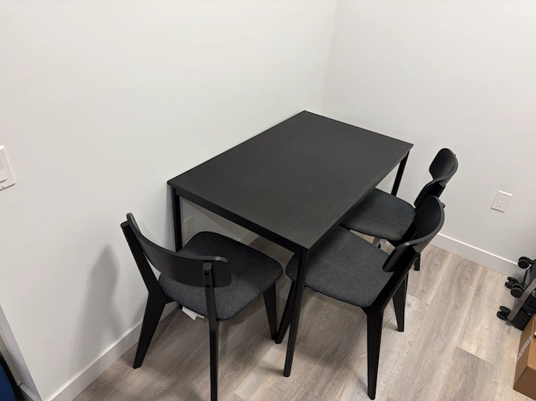 Black Dining Table with Three Chairs