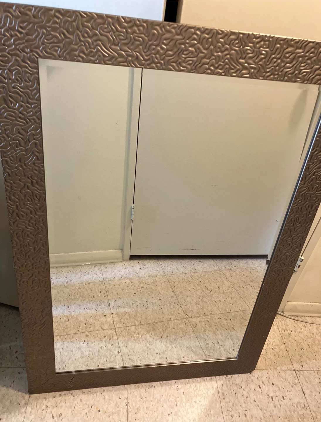 Wall mirror with textured bronze frame-42”x30”