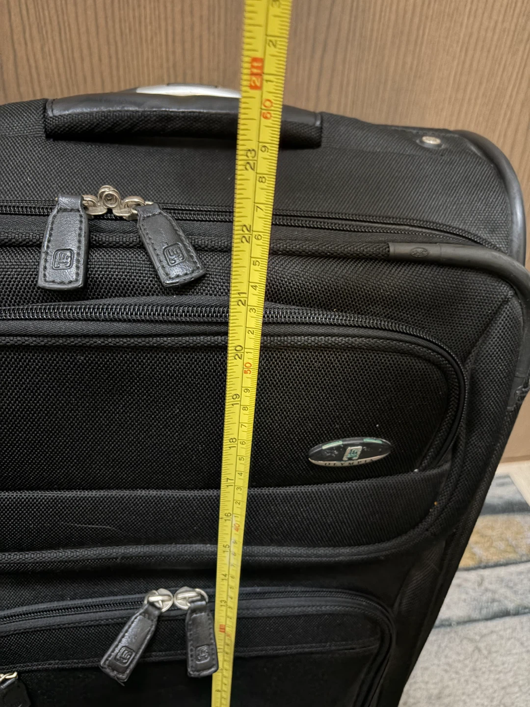 Olympia Black Rolling Suitcase