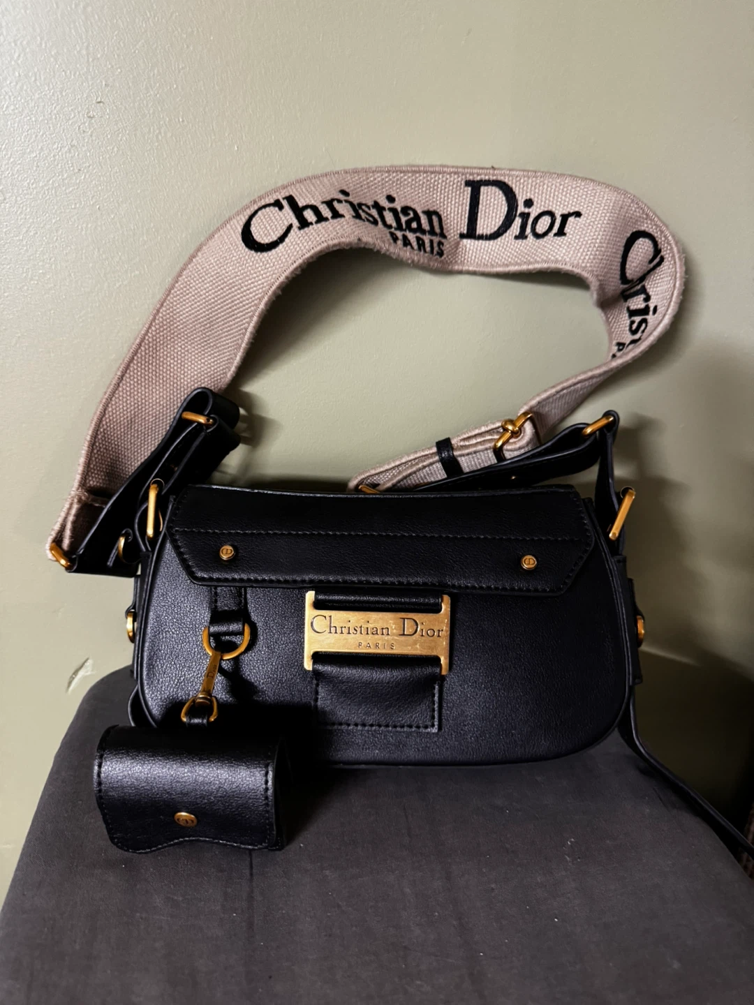 Christian Dior w/mini AirPods purse from “streetchic” line