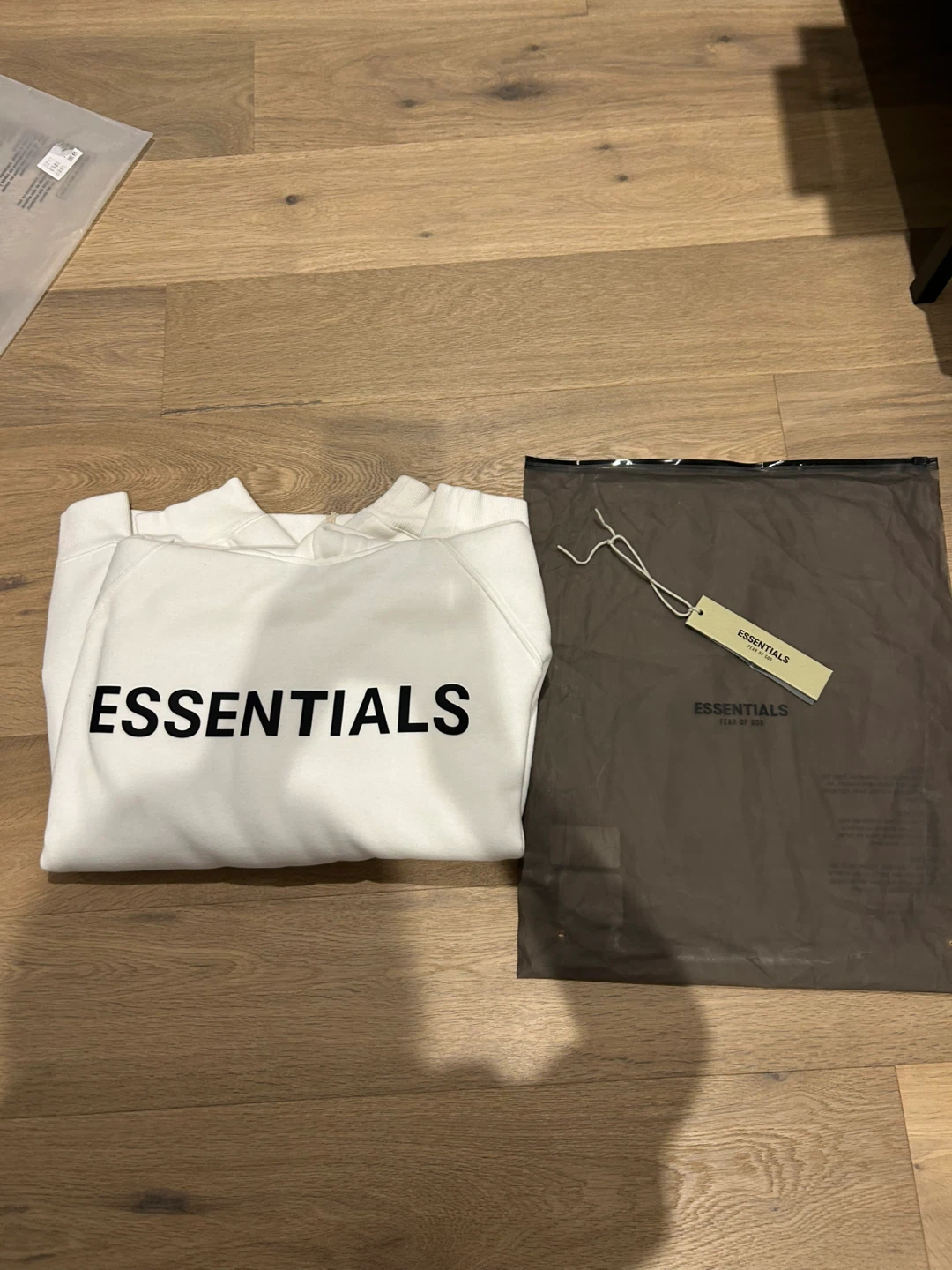 Fear of God Essentials White Hoodie