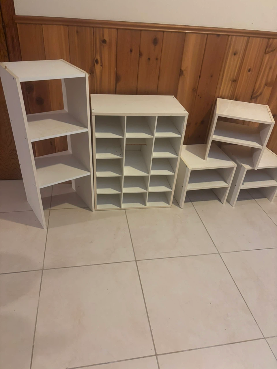 Set of white storage shelving units